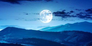 Full Moon Rising over Blue Night Landscape of Rolling Hills and Mountains. - Cambiando Mty